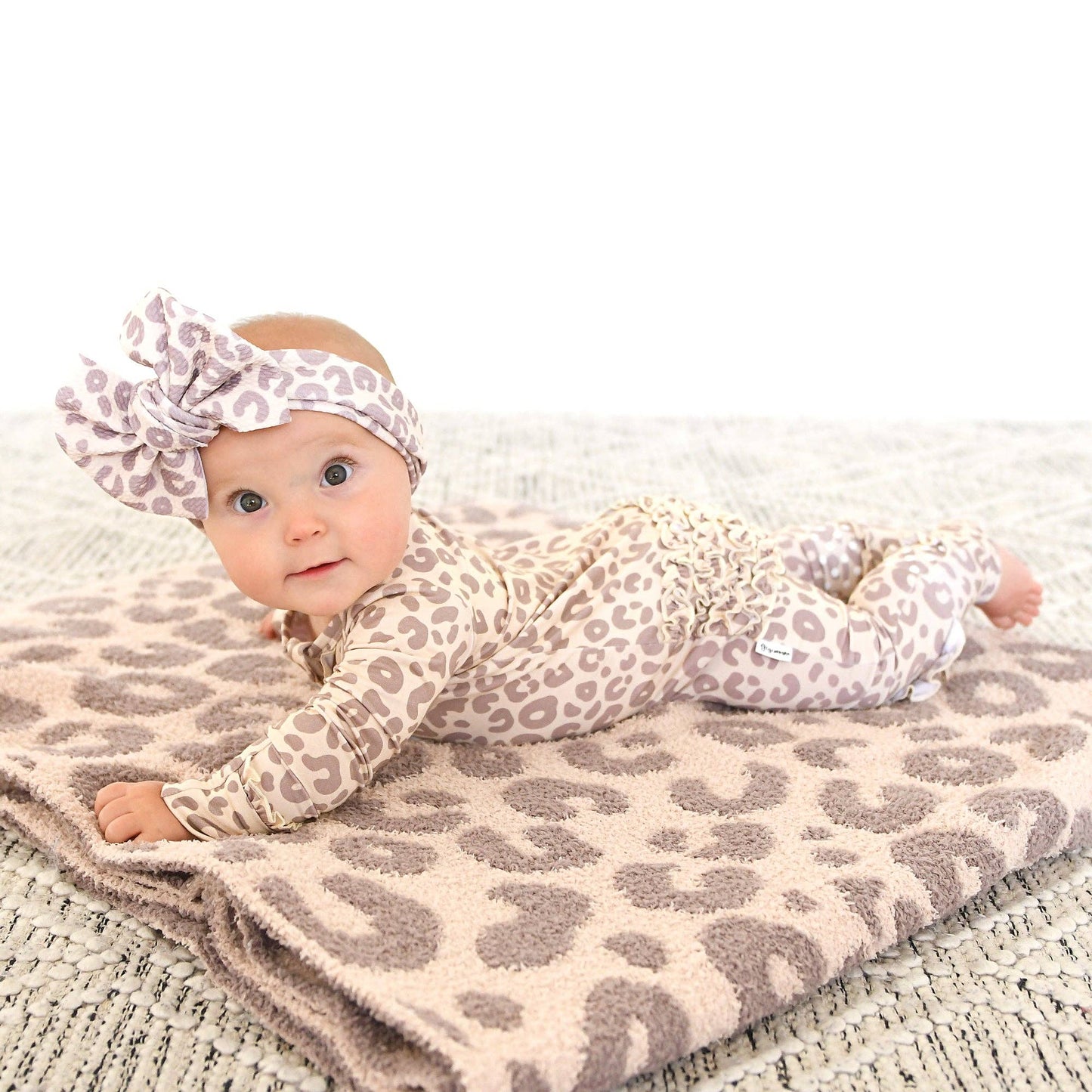 Amari Leopard RUFFLE ZIP Bamboo Onesie